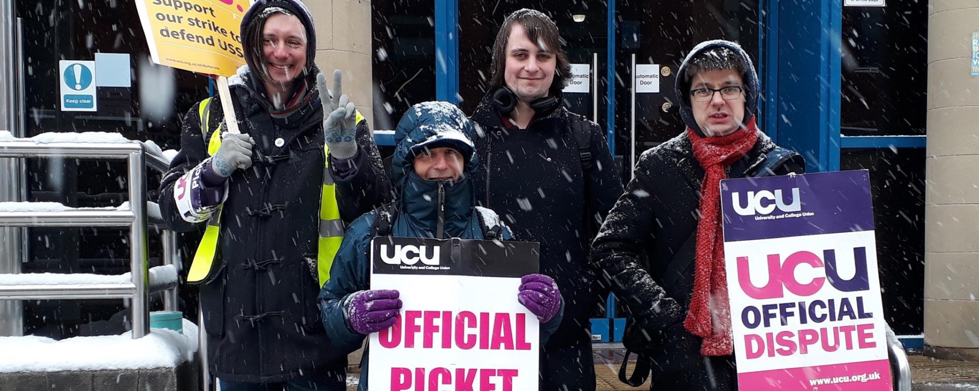 Me and three colleagues standing on the picket line in the snow