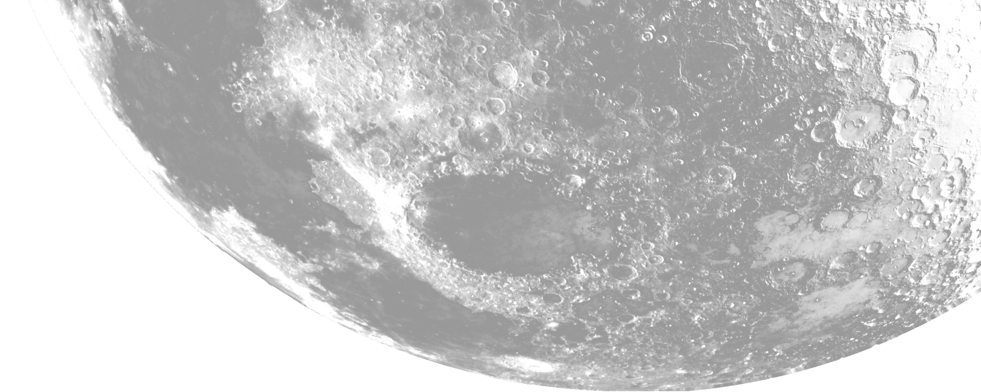 Section of a photo of the moon, showing craters and dark patches of rock